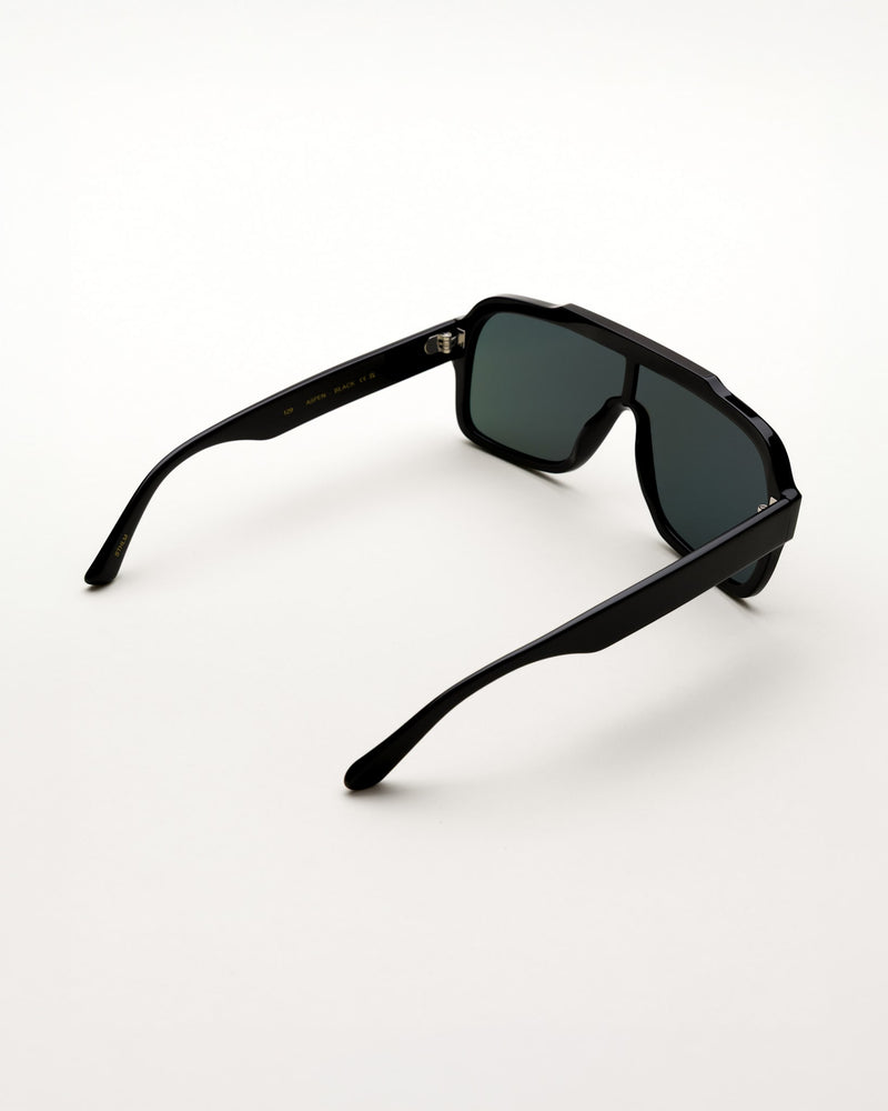 Aspen Black - green solid lens