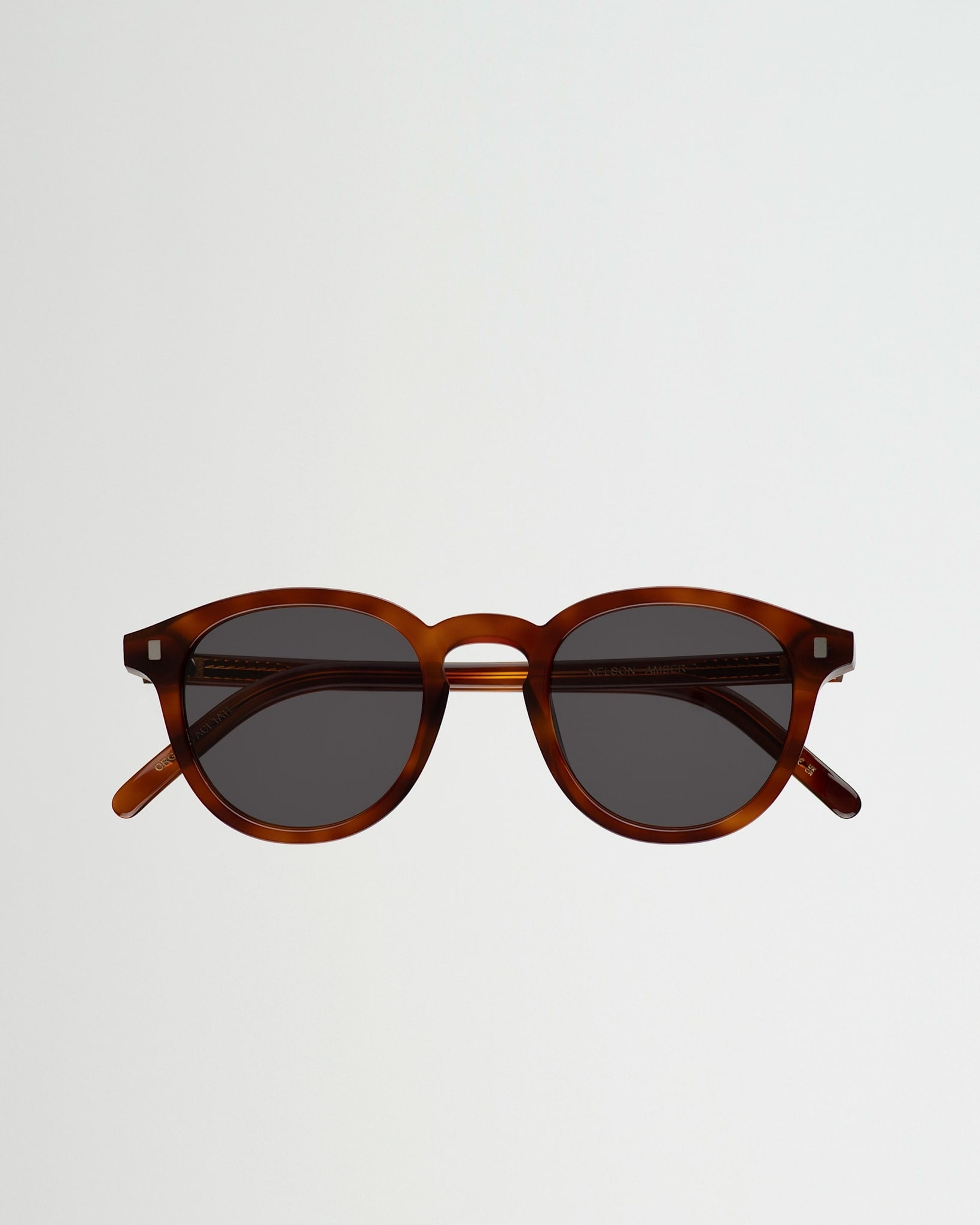 Nelson Amber - grey solid lens