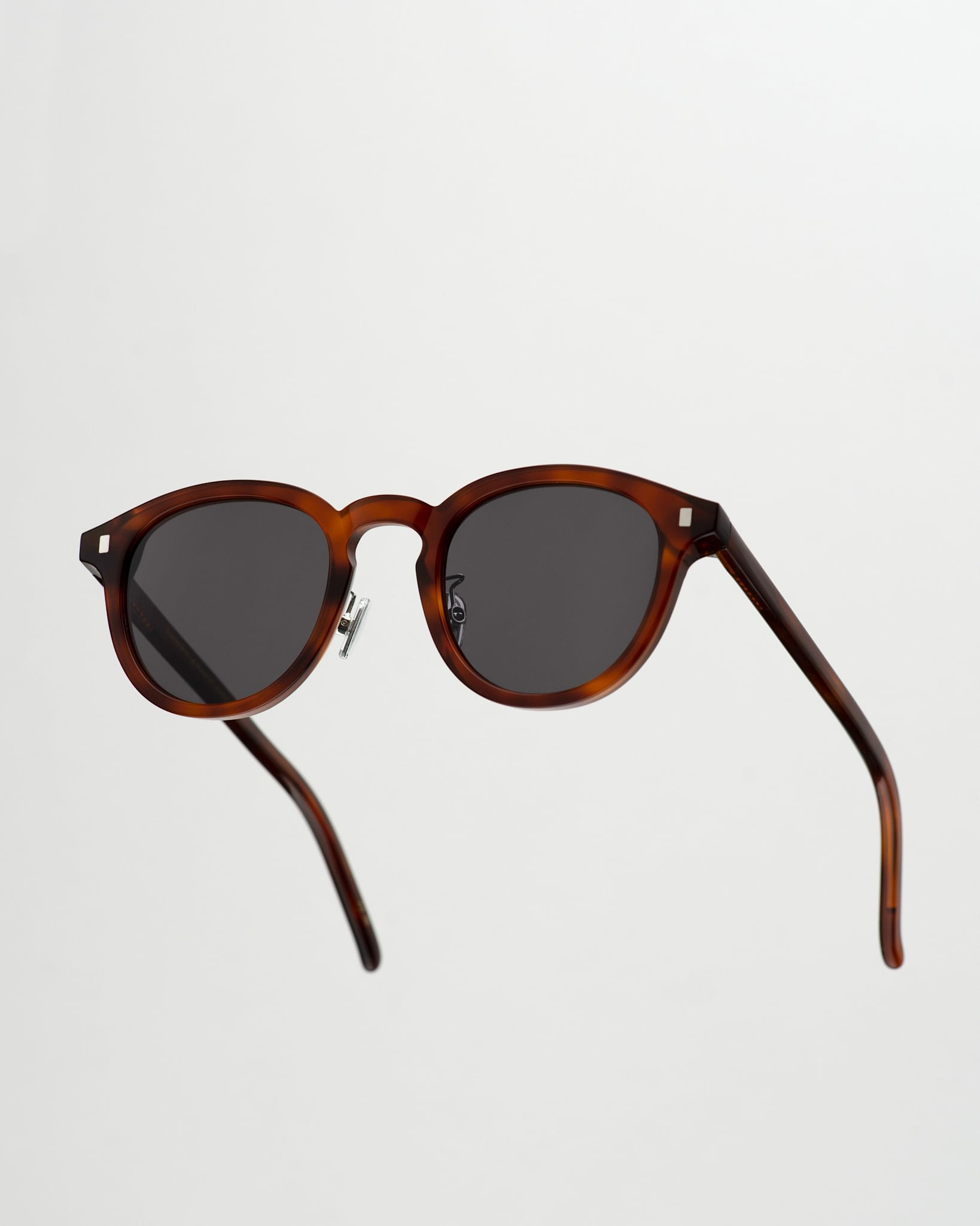 Nelson Amber - grey solid lens